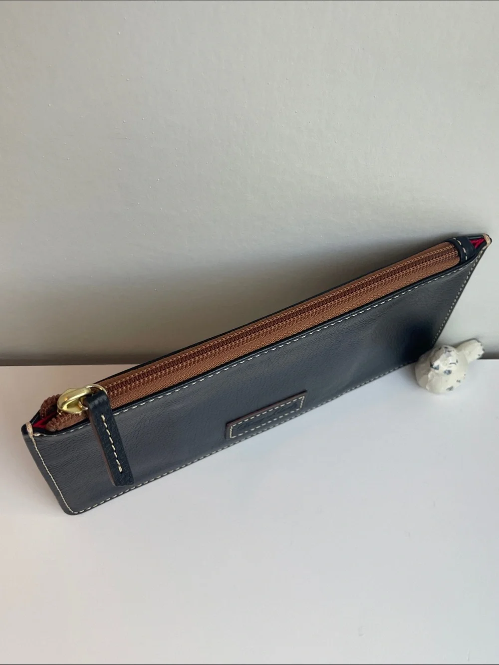 Dooney & Bourke Pebbled leather Slim Clutch